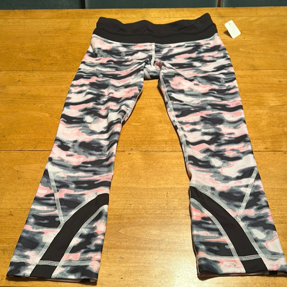 Great used condition multiple colored 3/4 leggings sz 4